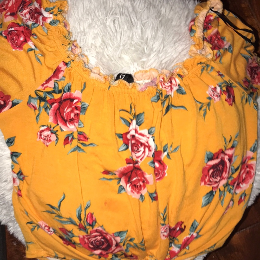 A cute fun summer croc top off the shoulder shirt!